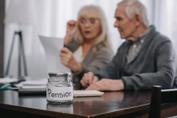 Selective Focus Glass Jar Pension Word Table Senior Couple Background — Stock Photo, Image