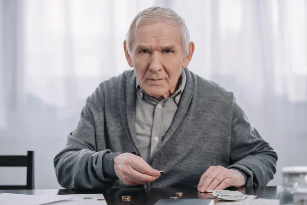 Senior Man Sitting Table Looking Camera Counting Money Home — Stock Photo, Image