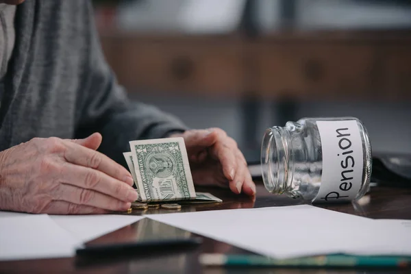 Cropped View Senior Man Sitting Table Money Glass Jar Pension — Stock Photo, Image