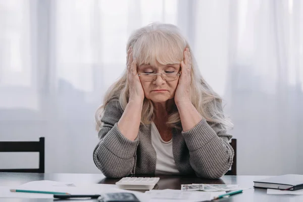 Stressed Senior Woman Sitting Table Money Paperwork While Having Headache — 图库照片