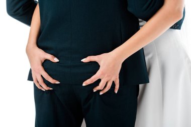 kadının erkek popo üzerinde beyaz izole sıkma kısmi görünümü