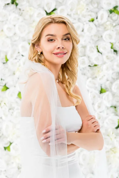 Smiling Beautiful Bride Crossed Hands Looking Camera White Floral Background — Stock Photo, Image