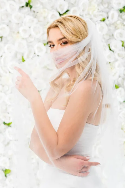 Attractive Young Bride Hiding Face Bridal Veil While Posing Camera — Stock Photo, Image
