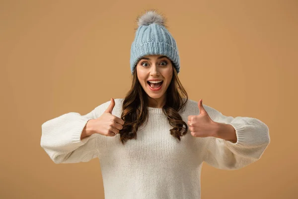 Laughing Happy Brunette Woman Knitted Hat Showing Thumbs Isolated Beige — Stock Photo, Image