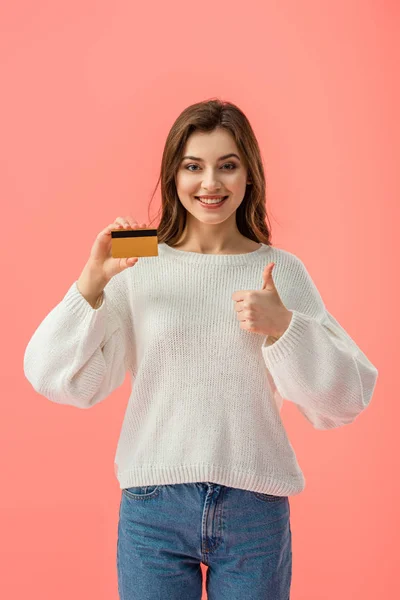 Smiling Brunette Girl Holding Credit Card Showing Thumb Isolated Pink — Stock Photo, Image