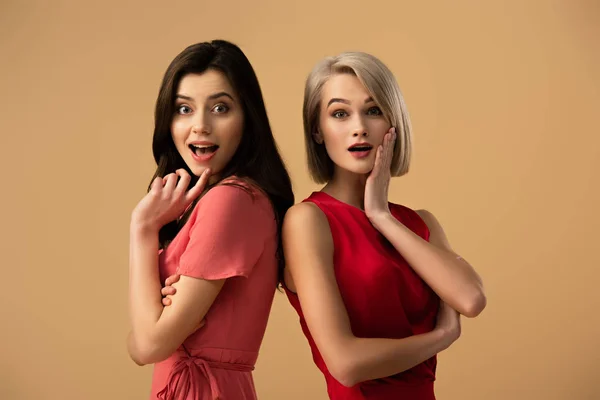 Surprised Beautiful Women Red Dresses Crossed Arms Isolated Beige — Stock Photo, Image