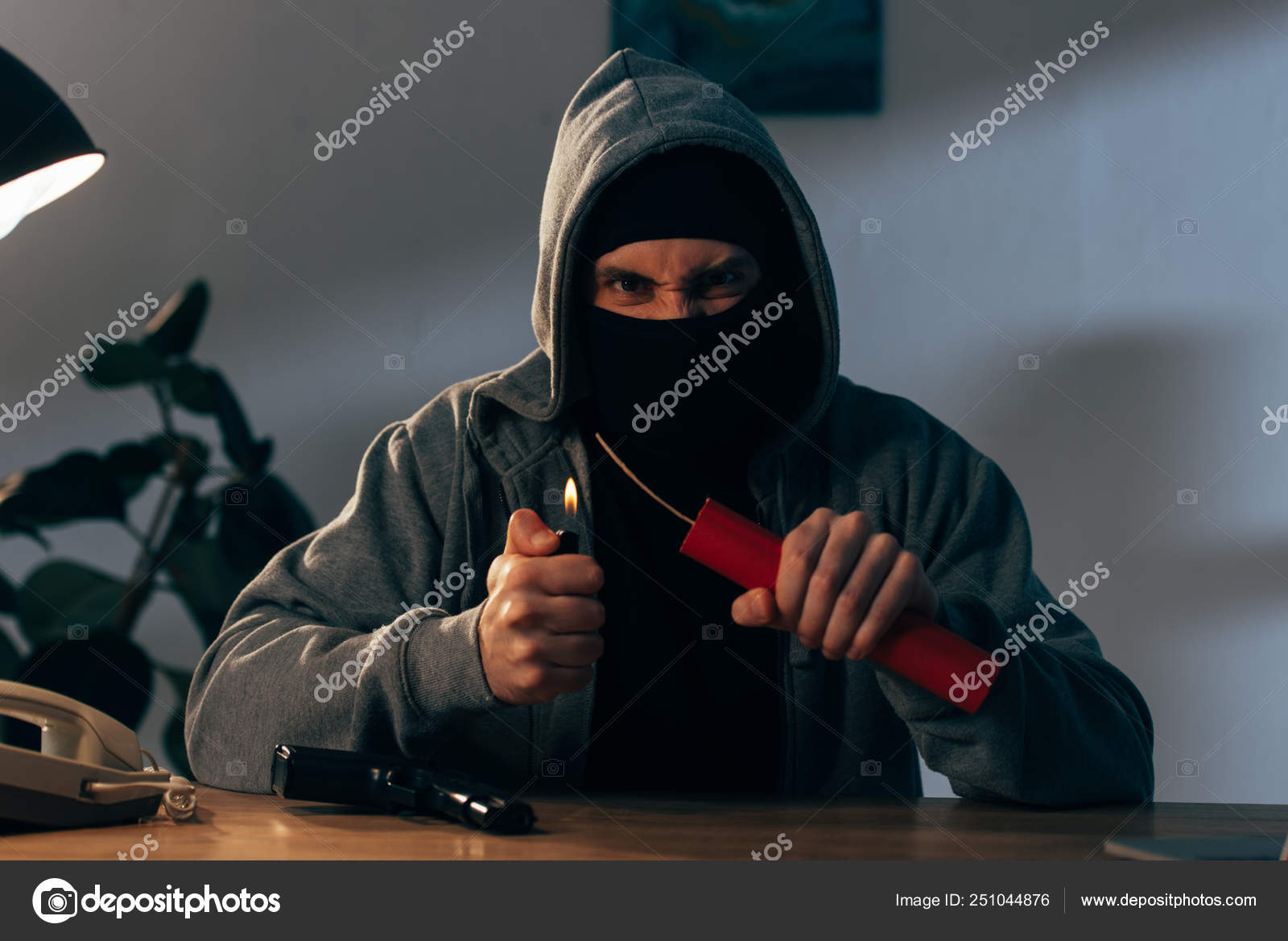 Angry Terrorist Mask Gun Igniting Dynamite Room Stock