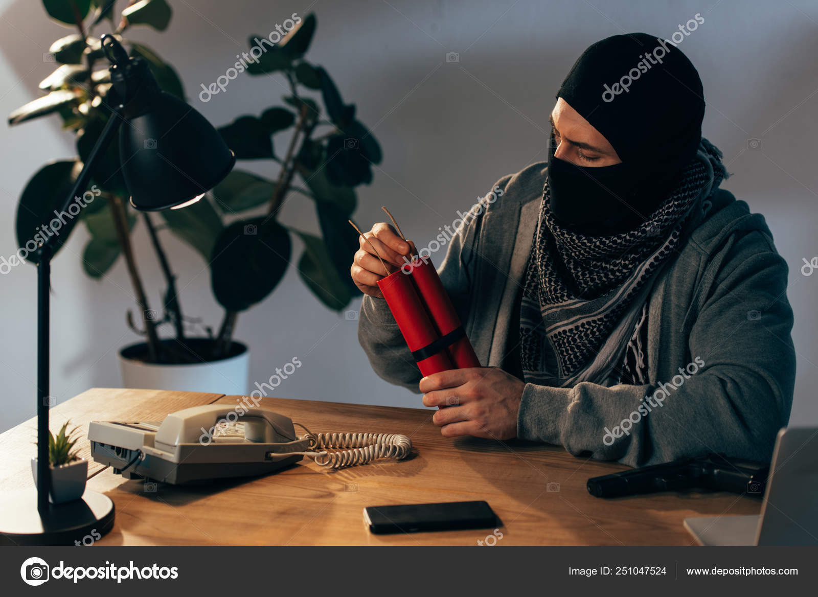 Terrorist Mask Sitting Table Dynamite Room Stock Photo