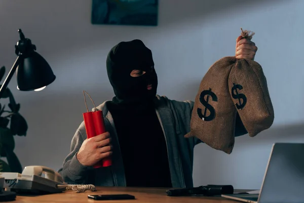 Terrorist Mask Holding Dynamite Looking Money Bags Room — Stock Photo, Image