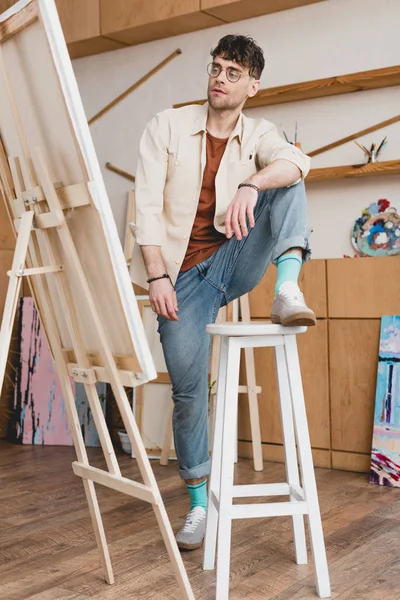 Handsome Artist Standing Foot Chair Looking Easel Canvas — Stock Photo, Image
