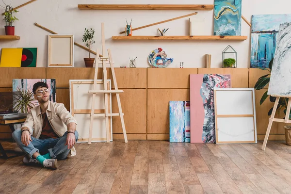 Artist Pink Shirt Blue Jeans Sitting Floor Spacious Painting Studio — Stock Photo, Image