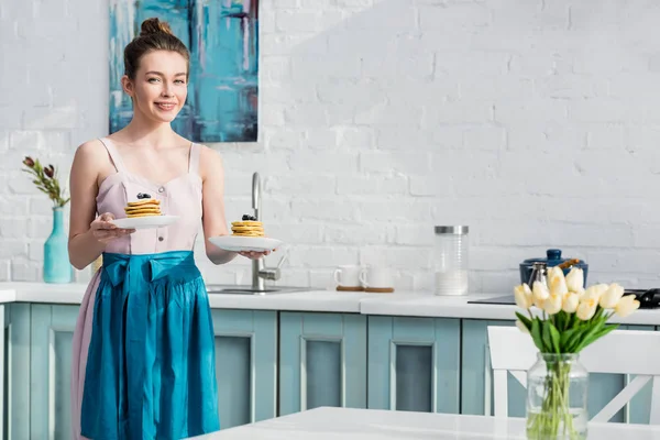 Selective Focus Smiling Elegant Girl Apron Serving Tasty Pancakes Kitchen — Stock Photo, Image