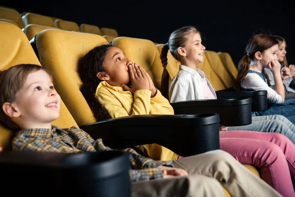 Smiling Multicultural Friends Sitting Cinema Watching Movie Together — Stock Photo, Image