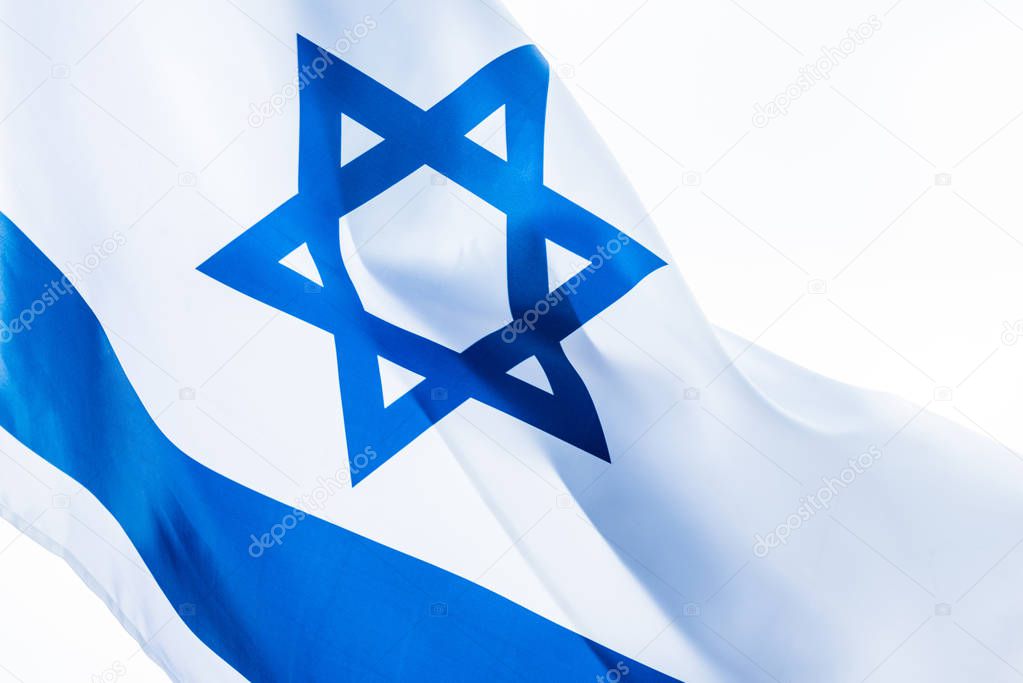 close up of national flag of israel isolated on white