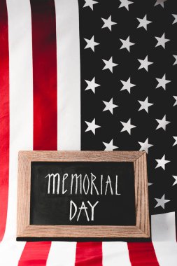 flag of memorial day lettering on chalkboard near america with stars and stripes clipart