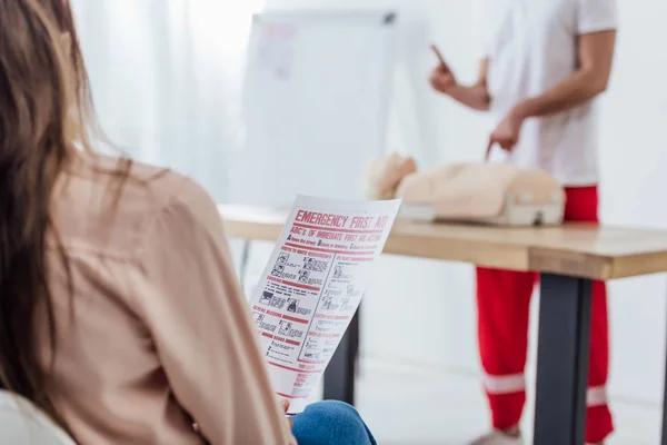 Back View Woman Holding First Aid Instruction Cpr Training Class — Stock Photo, Image