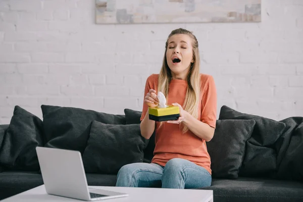 Attractive Woman Sneezing While Holding Tissue Box Laptop — Stock Photo, Image