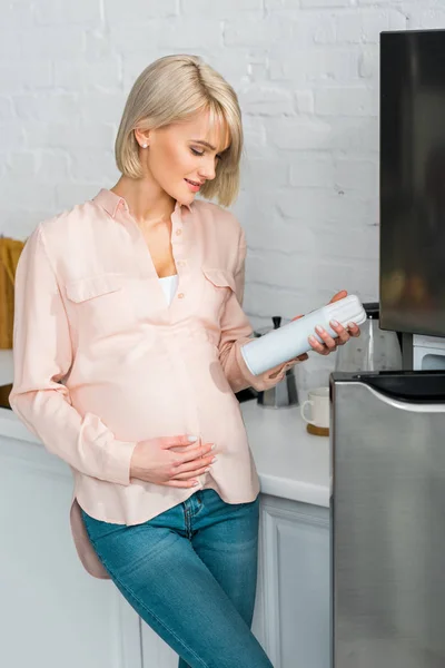 Cheerful Blonde Pregnant Woman Looking Can Whipped Cream While Holding — Stock Photo, Image
