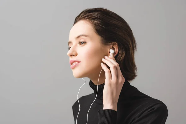 Attractive Woman Black Jumper Listening Music Earphones Isolated Grey — Stock Photo, Image