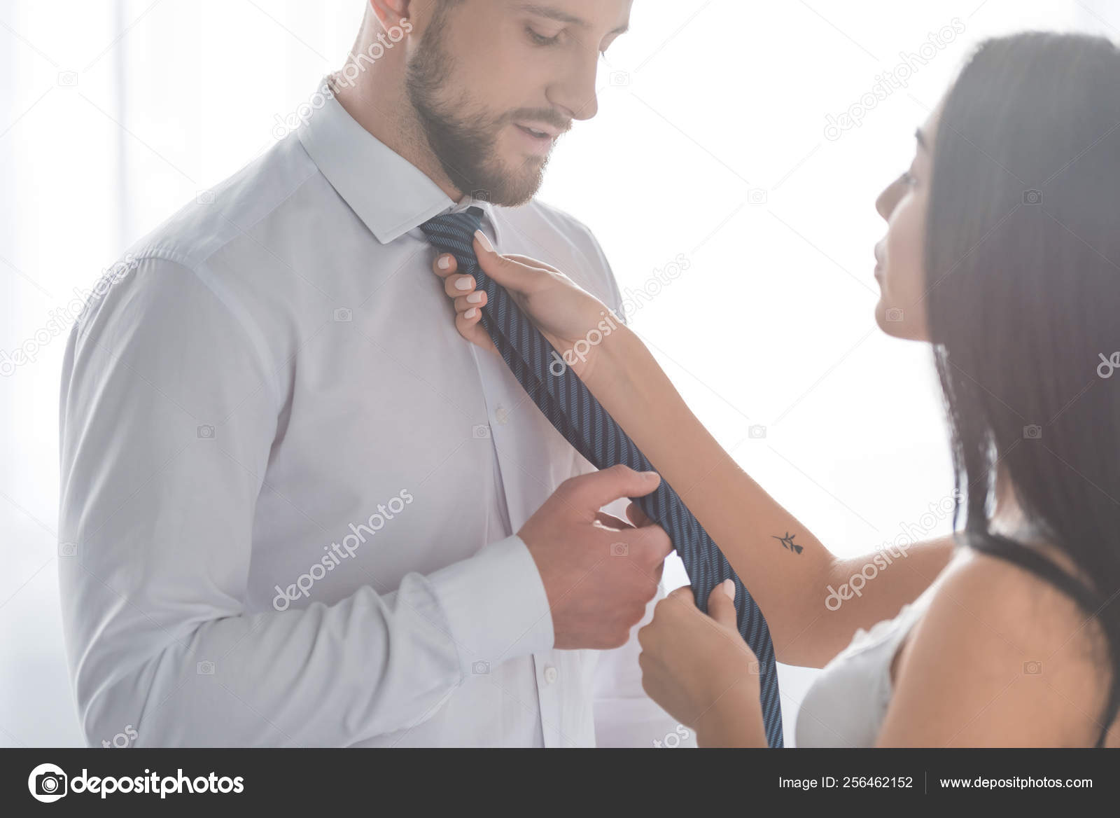 Beautiful Brunette Girl Holding Tie Bearded Handsome Boyfriend Shirt - Stoc...