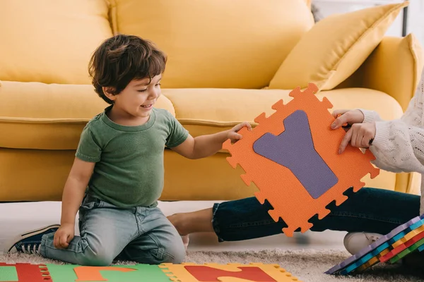 Cropped View Mother Son Playing Alphabet Puzzle Mat Carpet — Stock Photo, Image