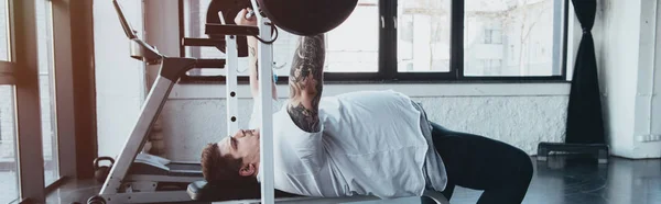 Panoramic Shot Overweight Tattooed Man Training Barbell Gym — Stock Photo, Image