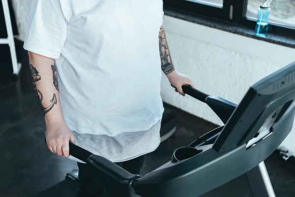 Partial View Overweight Tattooed Man Running Treadmill Sports Center — Stock Photo, Image