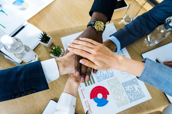 Top View Multicultural Men Women Putting Hands Together Charts Graphs — Stock Photo, Image