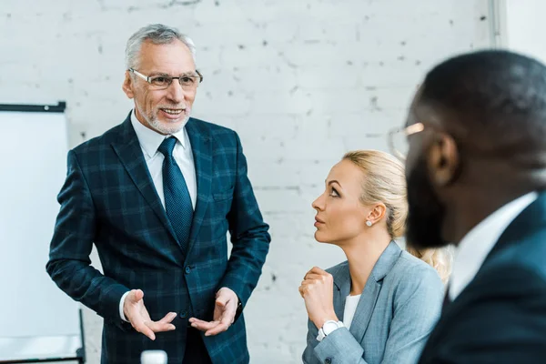 Selective Focus Cheerful Business Coach Eye Glasses Looking African American — Stock Photo, Image