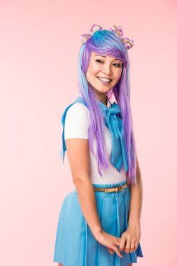 Happy asian anime girl in purple wig smiling on pink clipart