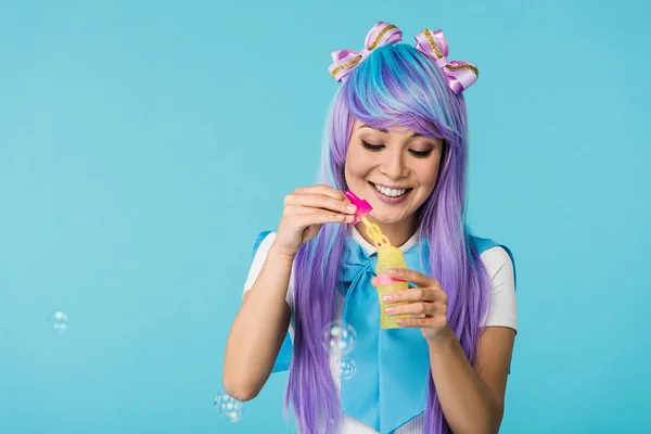 Asian Anime Girl Purple Wig Soap Bubbles Isolated Blue — Stock Photo, Image