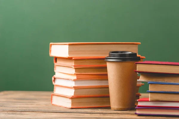 Books Disposable Cup Wooden Surface Green — Stock Photo, Image