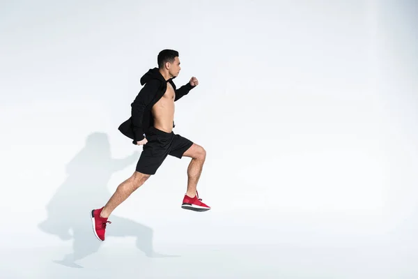 Side View Sportive Mixed Race Man Black Sportswear Running White — Stock Photo, Image