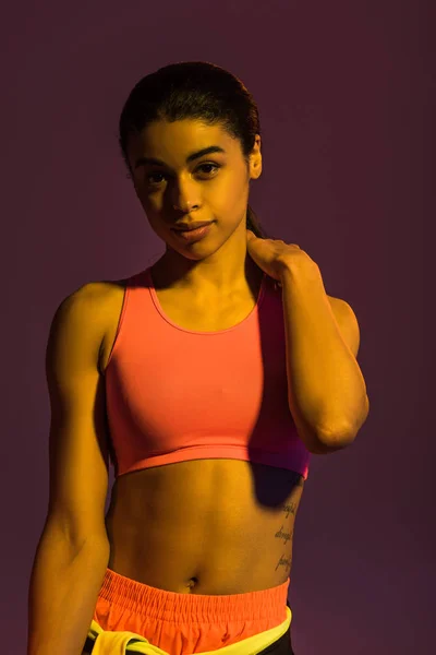 Pretty African American Girl Pink Sports Bra Looking Camera Purple — Stock Photo, Image