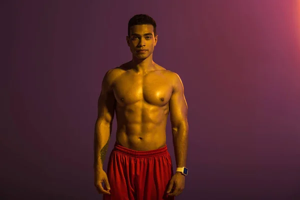 Sportive Mixed Race Man Muscular Torso Looking Camera Purple Background — Stock Photo, Image