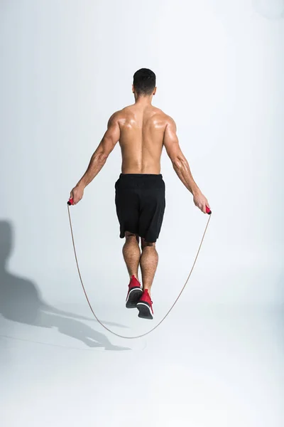 Back View Athletic Man Black Shorts Jumping Skipping Rope White — Stock Photo, Image