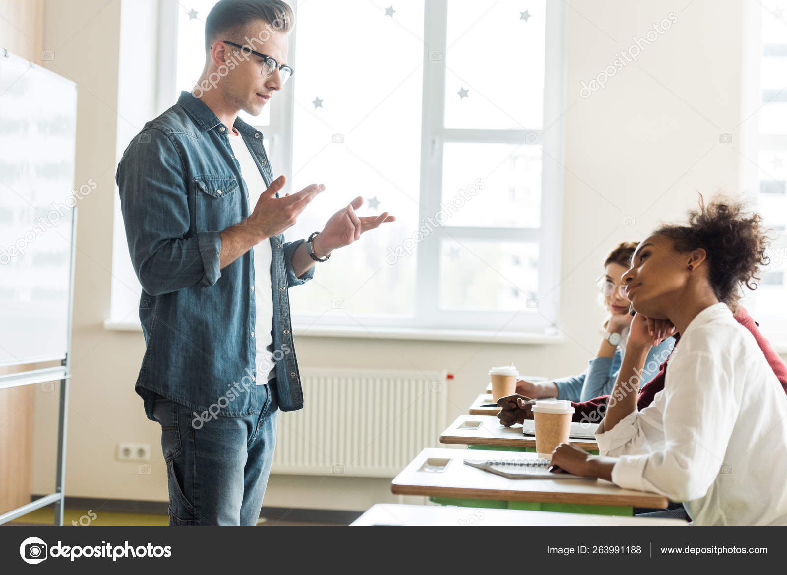 Student Glasses Denim Shirt Standing Front Desks Talking Friends