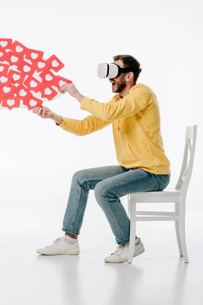 Excited Man Virtual Reality Headset Sitting Chair Holding Red Paper — Stock Photo, Image