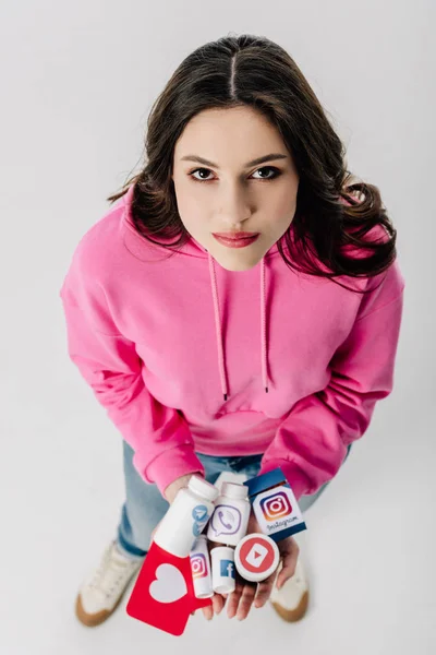 Overhead View Girl Holding Containers Social Media Logos Red Paper — Stock Photo, Image