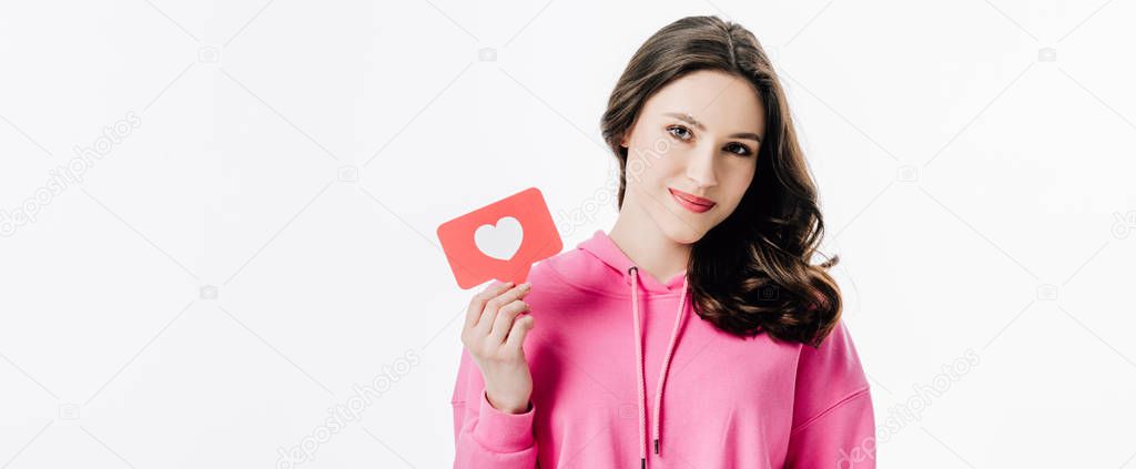 panoramic shot of pretty smiling girl holding red paper cut card with heart symbol isolated on white