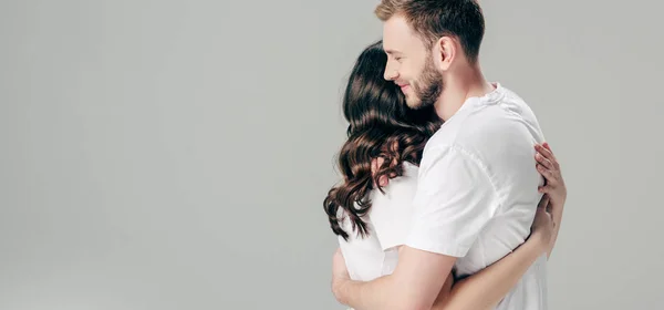 Panoramic Shot Happy Young Couple White Shirts Embracing Isolated Grey — Stock Photo, Image