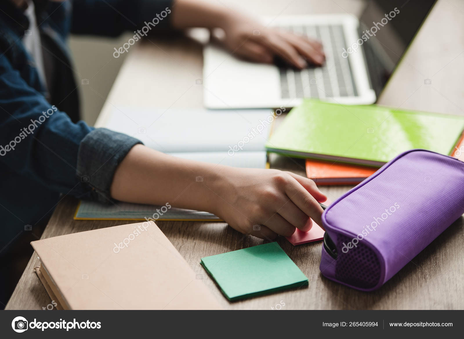 Cropped View Schoolboy Using Laptop While Sitting Desk Copy Books