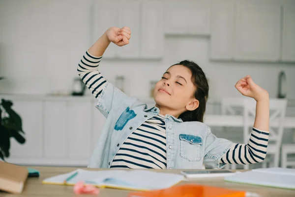 Tired Child Stretching Closed Eyes While Sitting Desk Doing Schoolwork — Stock Photo, Image