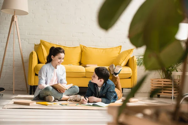 Selective Focus Cute Boy Lying Floor Sitting Sister While Doing — Stock Photo, Image