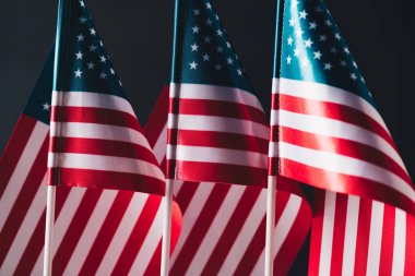 national flags of united states of america isolated on black, memorial day concept clipart