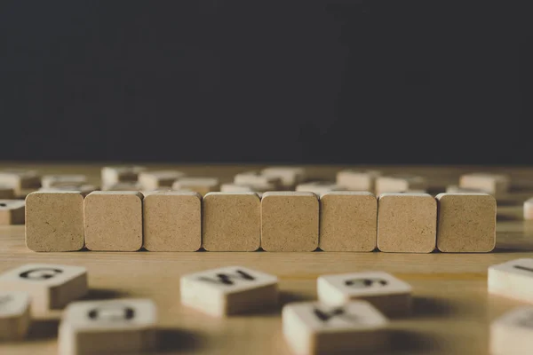 Selective Focus Eight Empty Cubes Surrounded Blocks Letters Wooden Surface — Stock Photo, Image