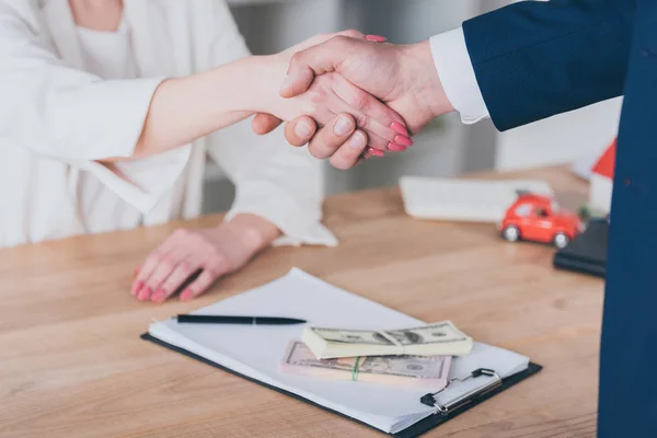 Partial View Woman Shaking Hands Businessman Dollar Banknotes Table — Stock Photo, Image