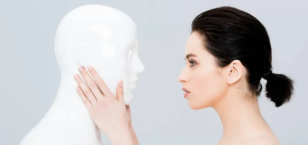 Panoramic Shot Beautiful Young Woman Touching Plastic Mannequin Isolated Grey — Stock Photo, Image