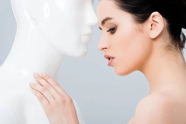 Beautiful Young Woman Touching Mannequin Isolated Grey — Stock Photo, Image