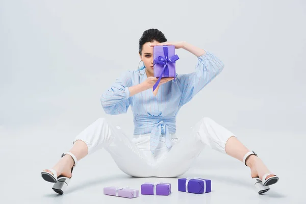 Beautiful Stylish Girl Sitting Presents Covering Face Gift Box Grey — Stock Photo, Image